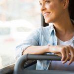 Woman_Traveling_On_Bus