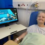 Betty-Hester-listening-to-Elvis-with-RITA-at-Lincoln-County-Hospital-400×300
