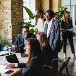 Multiracial business people working on sustainable innovation project – Focus on bald african girl face